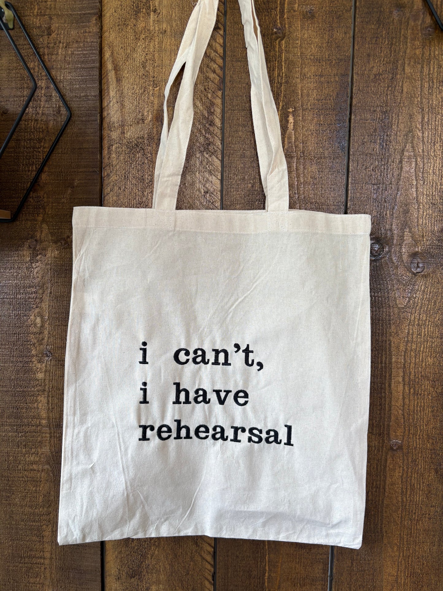 Embroidered statement tote bag
